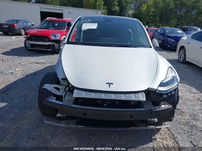 2023 TESLA MODEL Y AWD/LONG RANGE DUAL MOTOR ALL-WHEEL DRIVE - 7SAYGAEE7PF701268 | SeoVin.biz